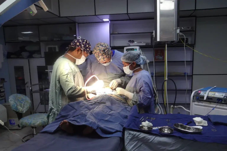 Dr. Rajib and the team performing surgery, from the original research and surgical programs page