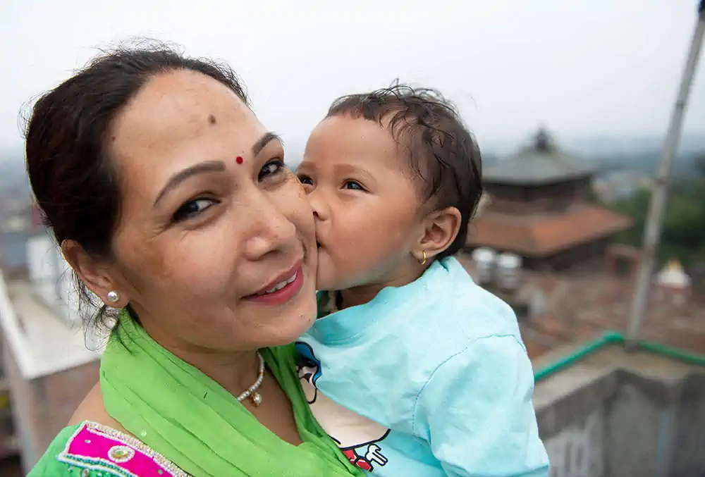 mrighna-kissing-mother-after-free-smile-train-cleft-lip-palate-surgery-nepal